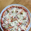 Піца з шинкою та грибами Болоньєтта Тратторія